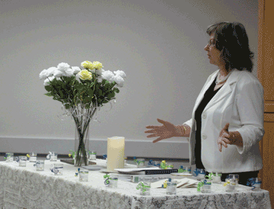 Kathy presenting the rededication ceremony.